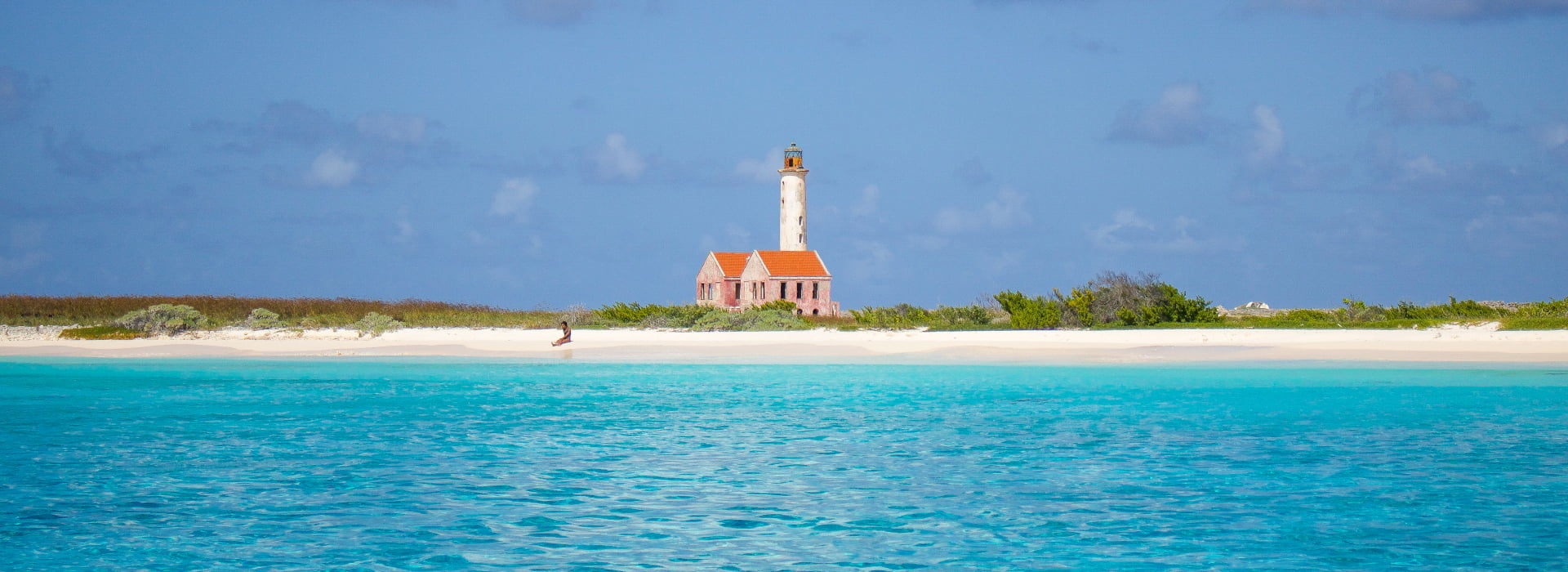 Leuchtturm Klein Curacao mit Meerjungfrauen-Bootsfahrten